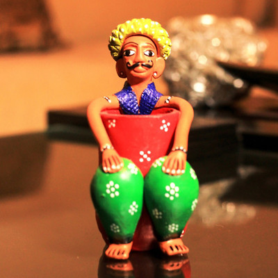 Unravel India Tribal Man Holder 1 Compartments Terracotta Pen Stand(Multicolor) 
Unravel India Tribal Man Holder 1 Compartments Terracotta Pen Stand(Multicolor)