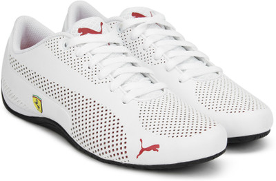 Puma SF Drift Cat 5 Ultra Motorsport Shoes For Men(White, Puma white-rosso corsa-puma black
Puma SF Drift Cat 5 Ultra Motorsport Shoes For Men(White, Puma white-rosso corsa-puma black