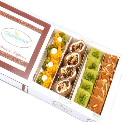 Ghasitaram Gifts Assorted Box of Pista Barfi, Kesar Pista Delight, Choco Boat and Besan Barfi(400 g, Box)
Ghasitaram Gifts Assorted Box of Pista Barfi, Kesar Pista Delight, Choco Boat and Besan Barfi(400 g, Box)