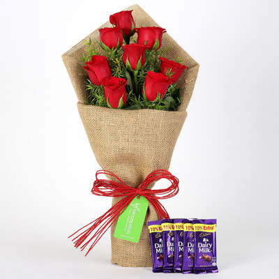 Ferns N Petals 8 Red Roses Bouquet & Dairy Milk Chocolates Combo(550gms)