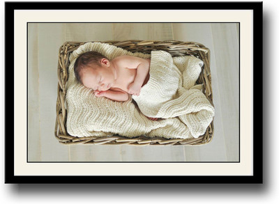 Baby sleeping cutely in basket Fine Art Print(10 inch X 14 inch, Framed)