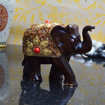 eCraftIndia Saluting Elephant coated with Red Stone Decorative Showpiece - 10.16 cm(Wooden, Brown)
eCraftIndia Saluting Elephant coated with Red Stone Decorative Showpiece - 10.16 cm(Wooden, Brown)