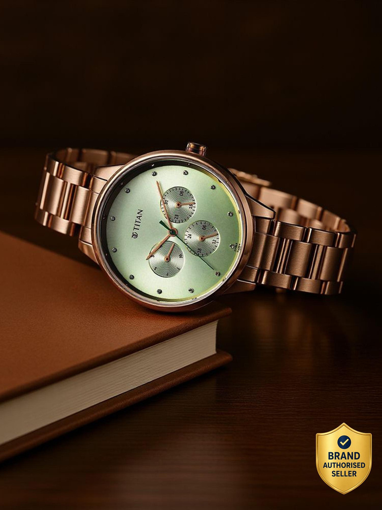 titan purple razzle dazzle green dial stainless steel strap analog watch women
