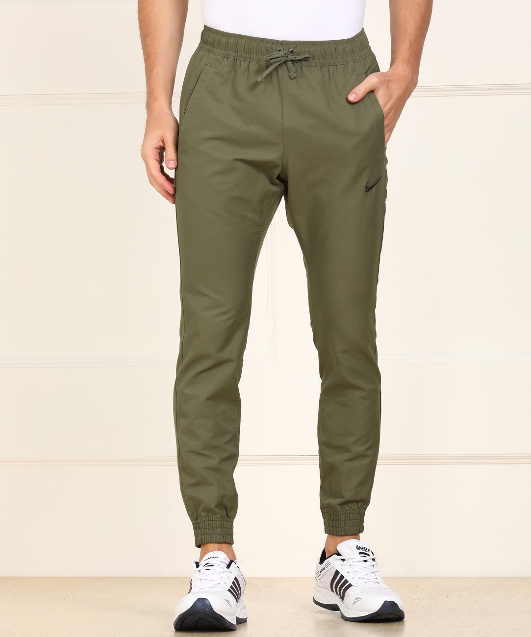 Nike Solid Men Green Track Pants - Buy 