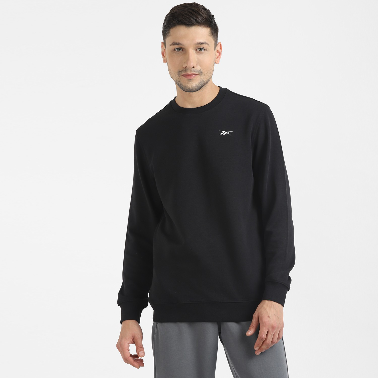 REEBOK Full Sleeve Solid Men Sweatshirt