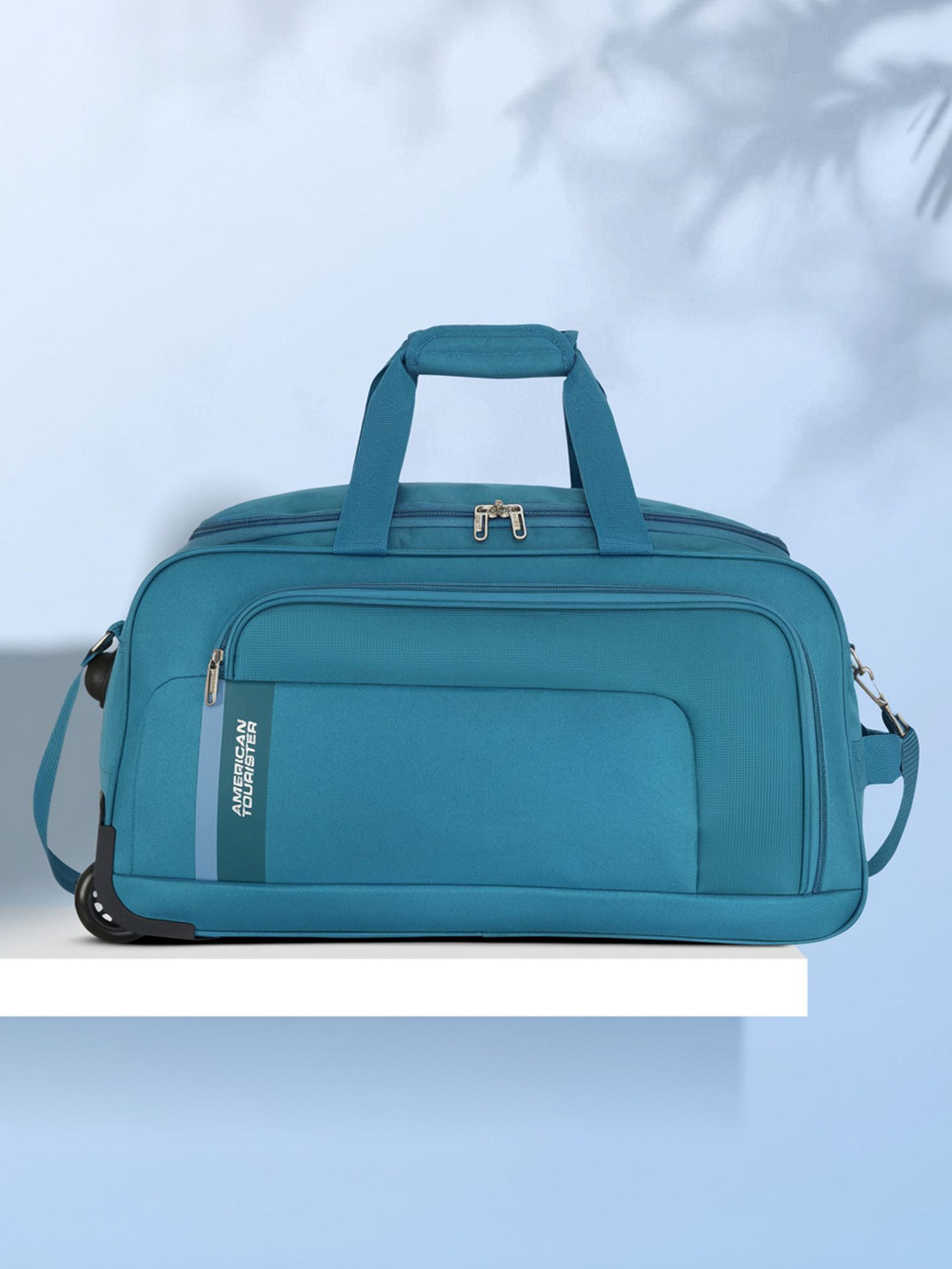 American Tourister Camp Wheel Duffle 57cm Teal – ₹1,399