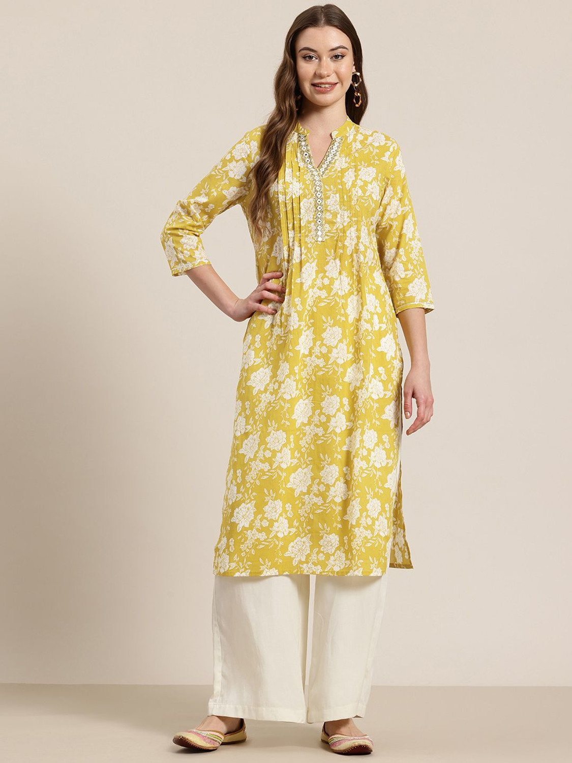 Image of PANCHHIRAJ TEXTILE Floral Print Cotton Blend Straight Kurta for Women (White, Brown)