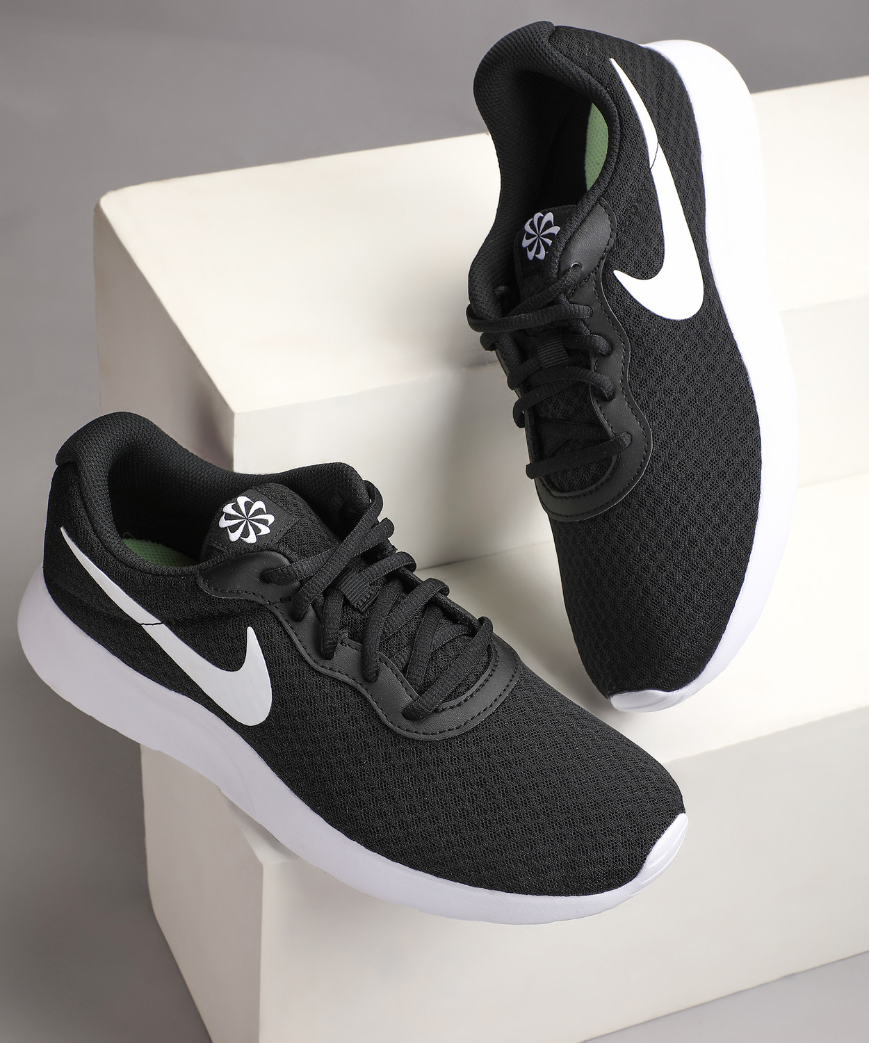 Nike tanjun original store price