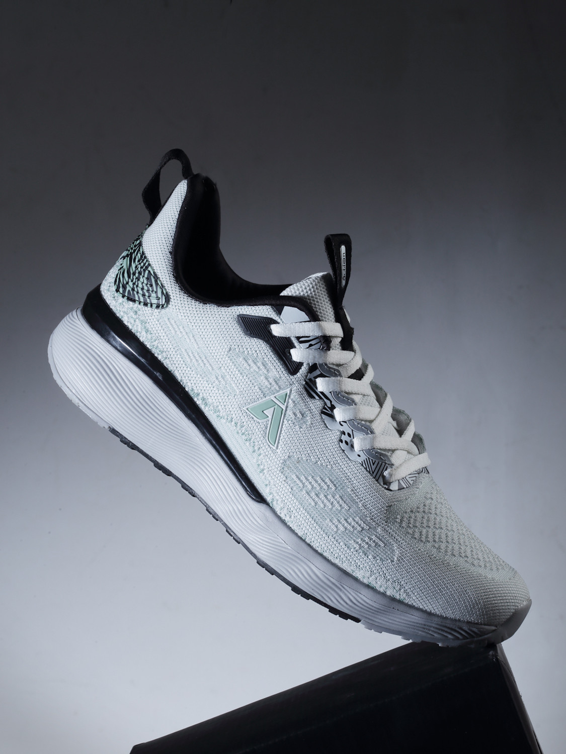 Action white online running shoes