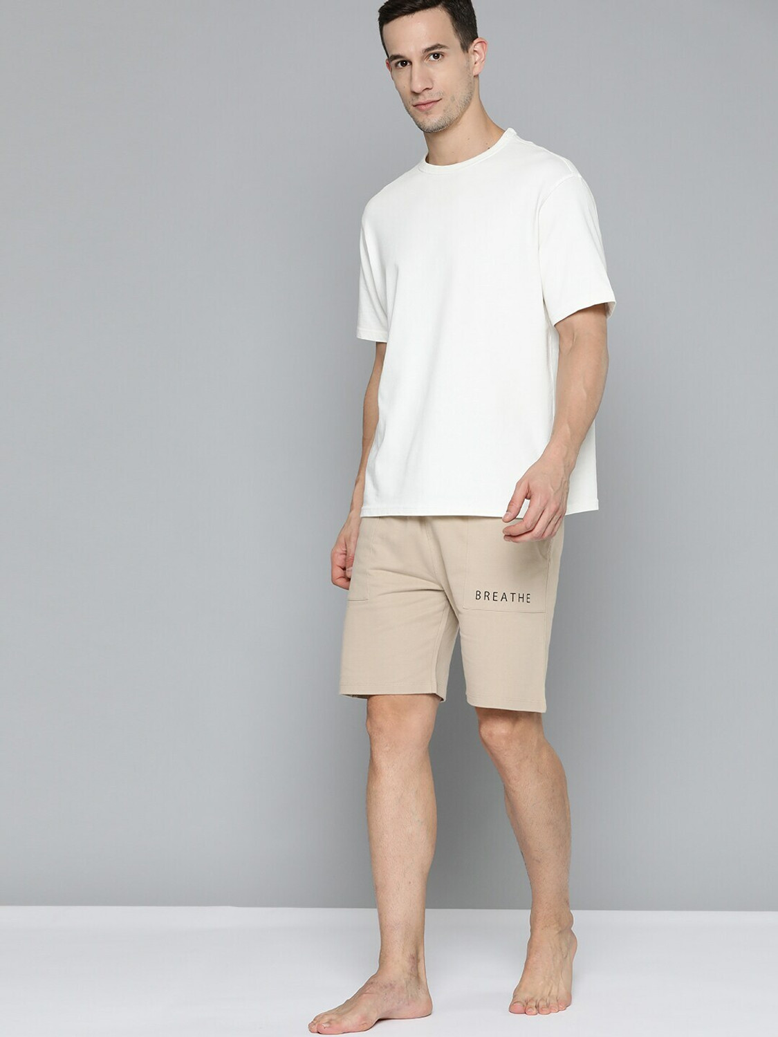 HRX by Hrithik Roshan Solid Men Beige Sports Shorts Price History