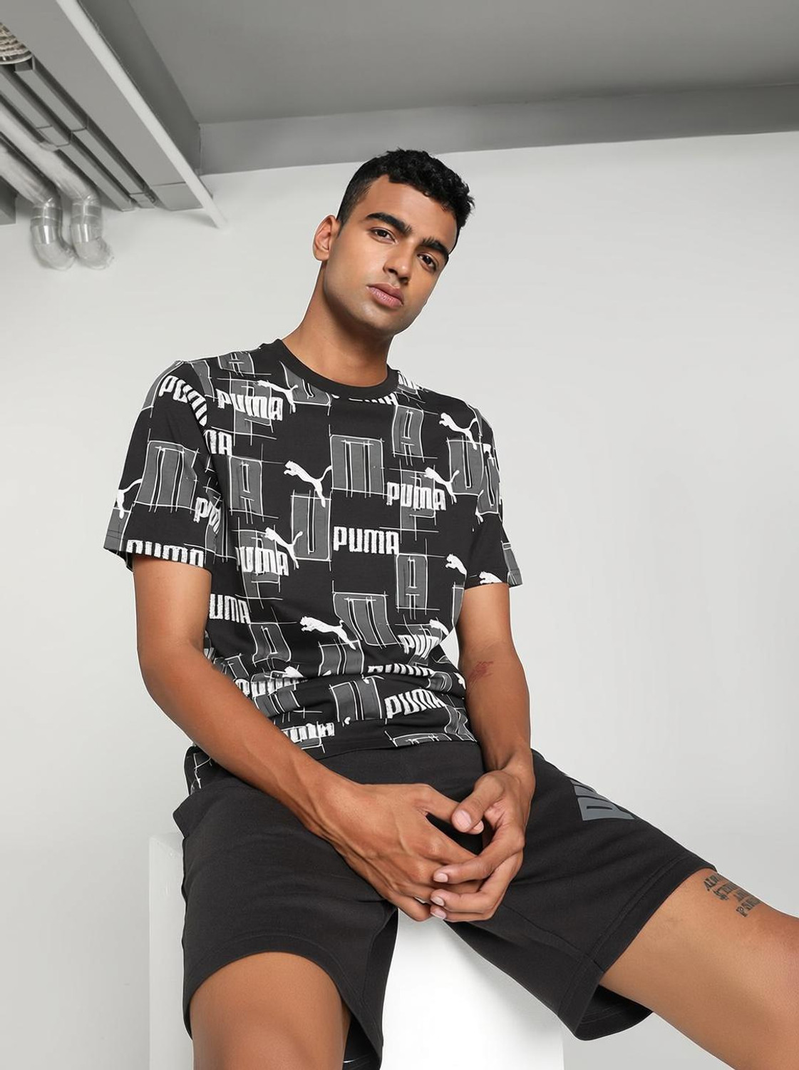Image of PUMA Men Printed Crew Neck Pure Cotton Black T-Shirt