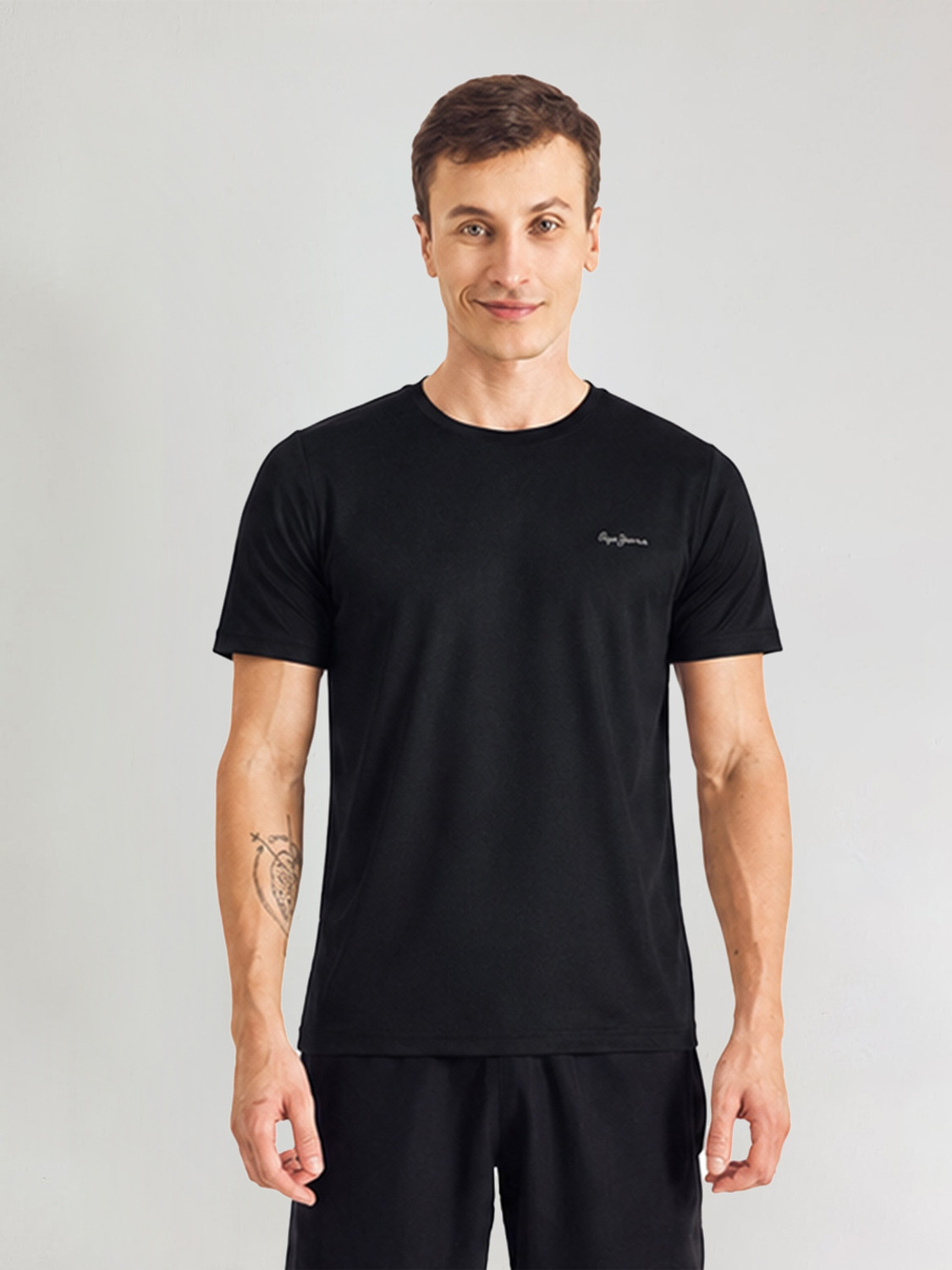 Image of HRX by Hrithik Roshan Men Printed Round Neck Polyester Black T-Shirt