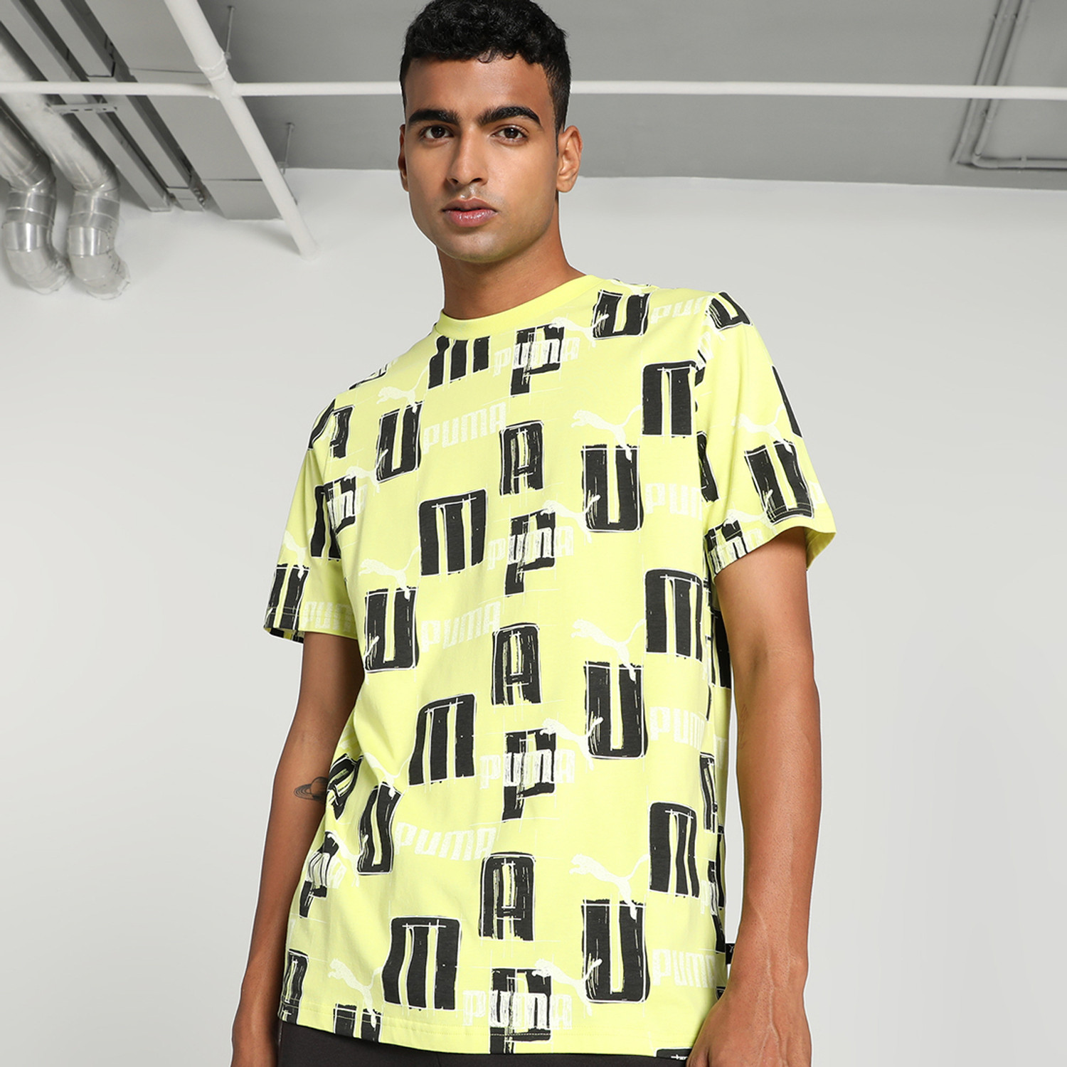 Image of PUMA Men Printed Crew Neck Pure Cotton Green T-Shirt