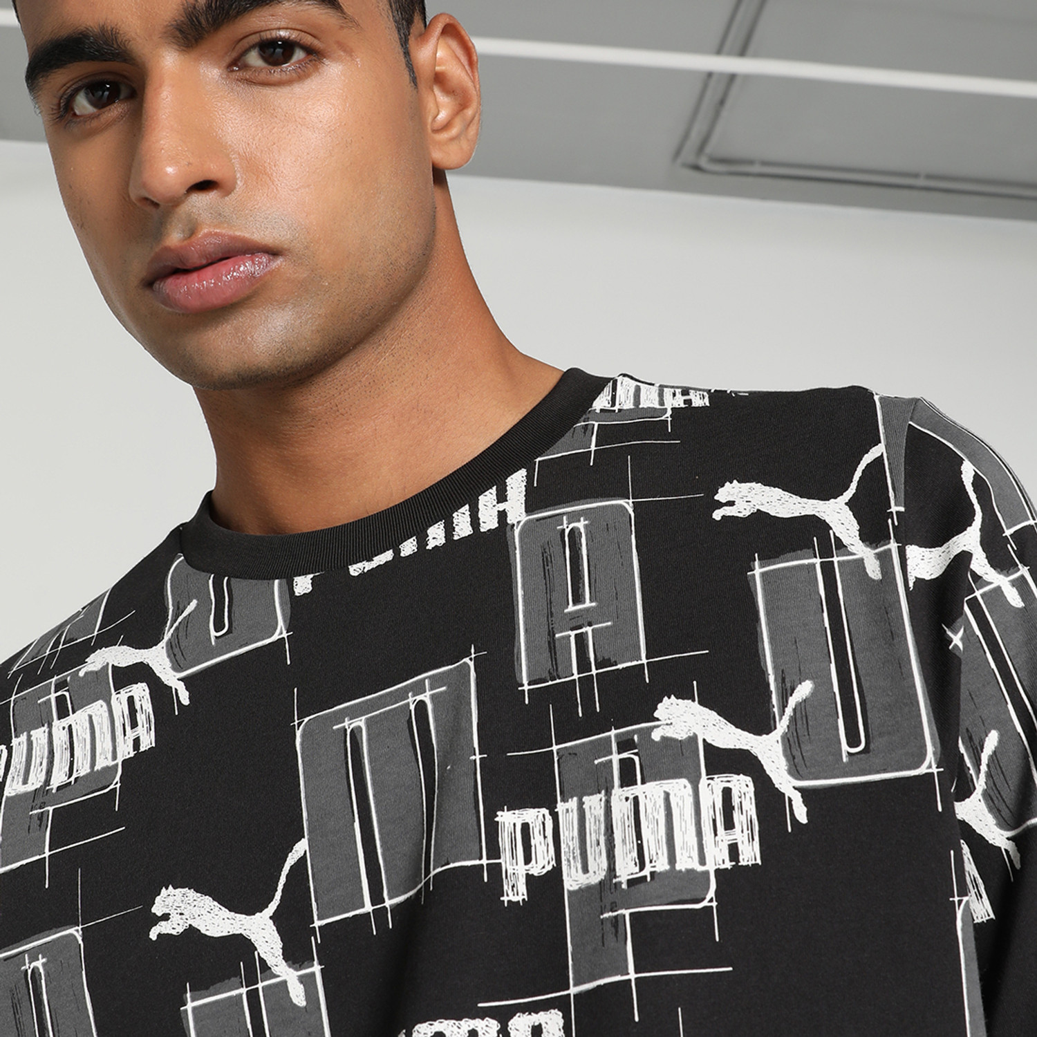 Image of PUMA Men Printed Crew Neck Pure Cotton Black T-Shirt