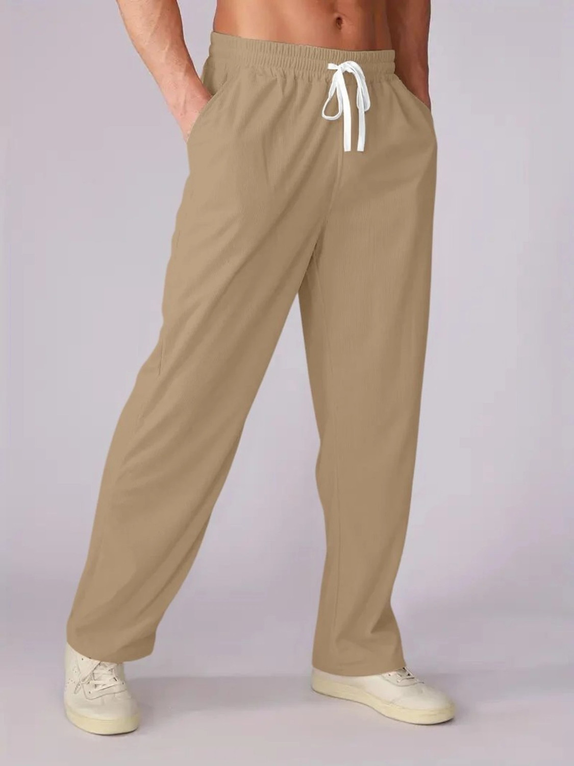 Image of COMBRAIDED Men Loose Fit Beige Corduroy Trousers