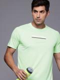 HRX by Hrithik Roshan Solid Men Round Neck Green T-Shirt