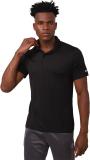 REEBOK Solid Men Polo Neck Black T-Shirt