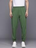 HRX by Hrithik Roshan Solid Men Green Track Pants