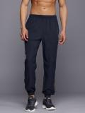 HRX by Hrithik Roshan Solid Men Blue Track Pants