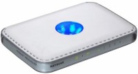 NETGEAR WPN824 RangeMax Wireless Router - Wireless router - 4-port switch - 802.11 Super G, 802.11b/g - desktop 100 Mbps Router(White, Single Band)