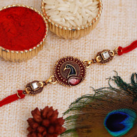 Peacock Rakhi, Chawal Roli Pack Set by eCraftIndia(Gold Finish, Kundan, Mauli Thread, 1 N Rakhi, 1 Roli Chawal)