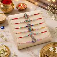Thread 4028-Designer Rakhi Combo Pack of 6 for Brother Mauli Thread, Assorted Rakhi, Chawal Roli Pack, Greeting Card Set by PRIDE STORE(6 Rakhi, 1 Greeting Card, 1 Roli chawal)