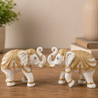 Rjkart Rjkart Elephant Showpieces For Home Decor set of elephant Decorative Showpiece  -  9 cm(Polyresin, Marble, White, Gold)