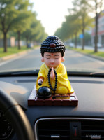 DECOVATE Solar Powered Buddha Bobblehead car, office desks, or home decor Decorative Showpiece  -  9.5 cm(Plastic, Yellow)