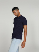 PUMA Solid Men Polo Neck Blue T-Shirt