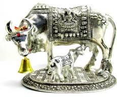SHIVOHAM Kamdhenu Cow with Calf (Laxmi & Gannesh ji Crafted on Kamdhenu Cow For Good Luck & Prosperity) Showpiece - 16 cm(Alloy, Silver) Image