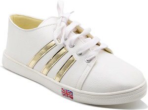 white shoes with golden stripes