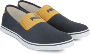 puma elara slip on idp slip on sneakers for men(black, yellow)