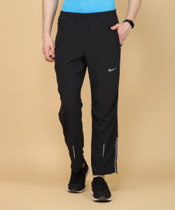 NIKE Solid Men Black Track Pants Buy BLACK OR GREY NIKE Solid