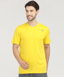 REEBOK Solid Men Round Neck Yellow T Shirt Buy REEBOK Solid Men
