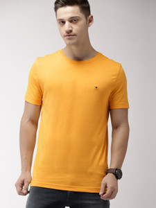 TOMMY HILFIGER Solid Men Round Neck Yellow T Shirt Buy TOMMY