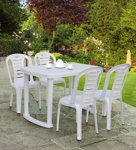 White plastic table sales and chairs