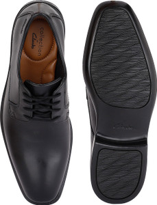 clarks slip on black shoes