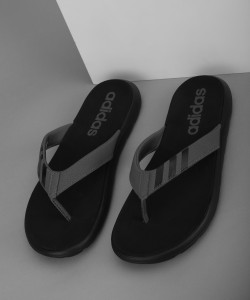 Grey adidas flip store flops