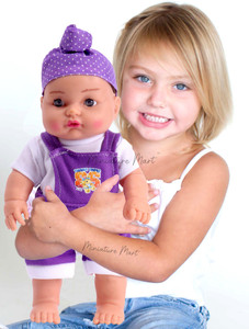 Size of baby born sales doll