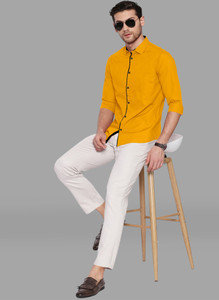 Yellow shirt clearance white pants