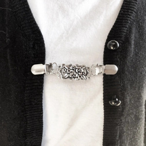 Cardigan brooch shop