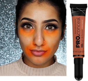 Orange concealer on sale