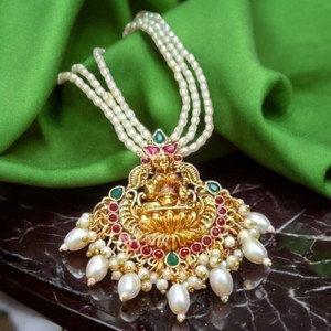 Pearls with lakshmi pendant best sale