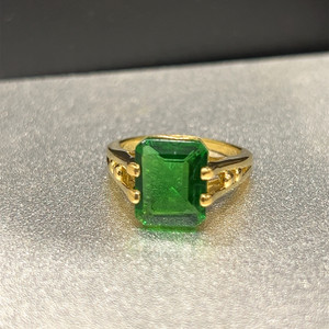Gold ring with online green diamond