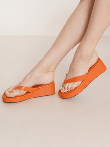 Orange wedge flip flops 2025