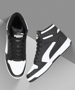 puma black and white high tops