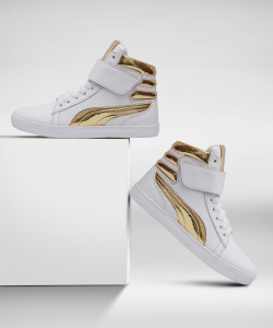 white and gold nike high tops