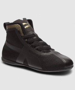 PUMA Eskiva Mid EVO Wn s Boots For Women Buy Puma Black Gold Color PUMA Eskiva Mid EVO Wn s Boots For Women Online at Best Price Shop Online for Footwears in India