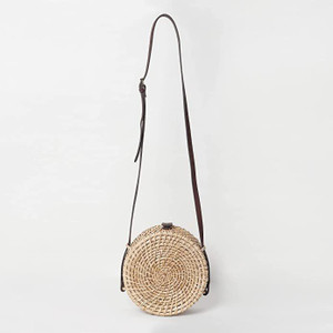 Round cane sling hot sale bag