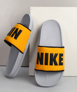 Nike slippers yellow store
